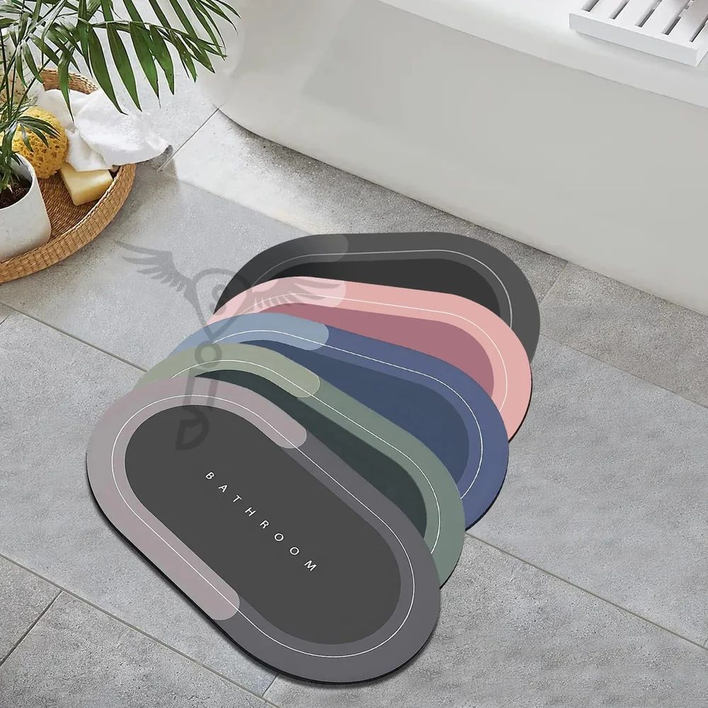 Set of colorful bath mats labeled 'Bathroom' on a tiled floor.