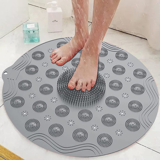 Person stepping onto a textured gray mat in a bathroom setting